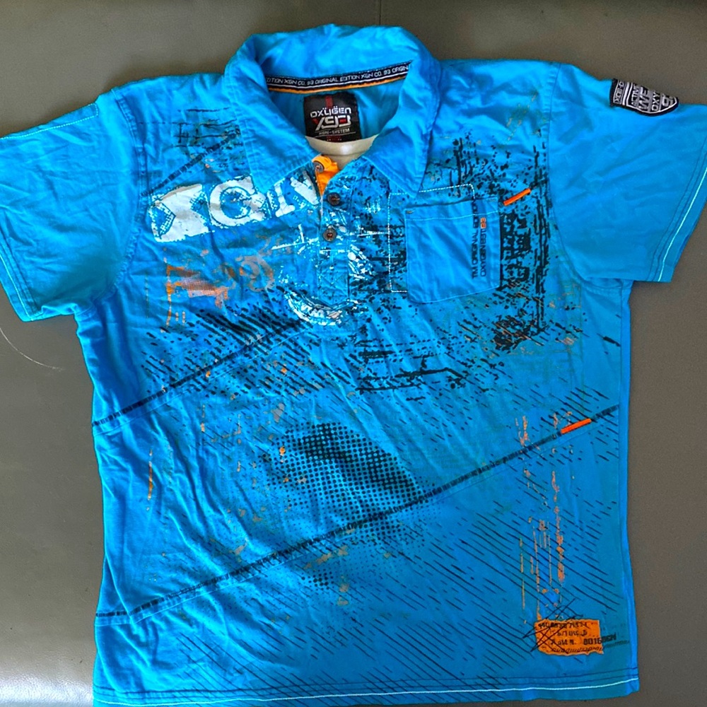 Oxygen polo type shirt with fake white t shirt insert.